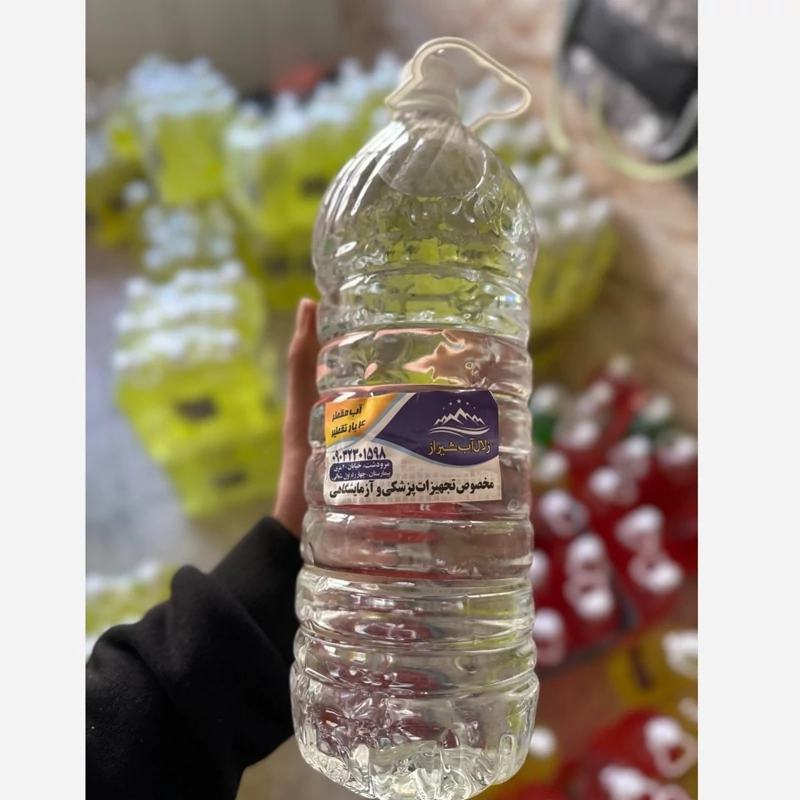 آب مقطر 2 لیتری 4 بار تقطیر شده (پس کرایه)